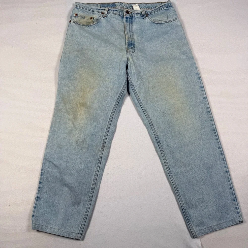 Vintage 90s Levis 550 Relaxed Fit Tapered Jeans Light Wash 38x28 Made in USA